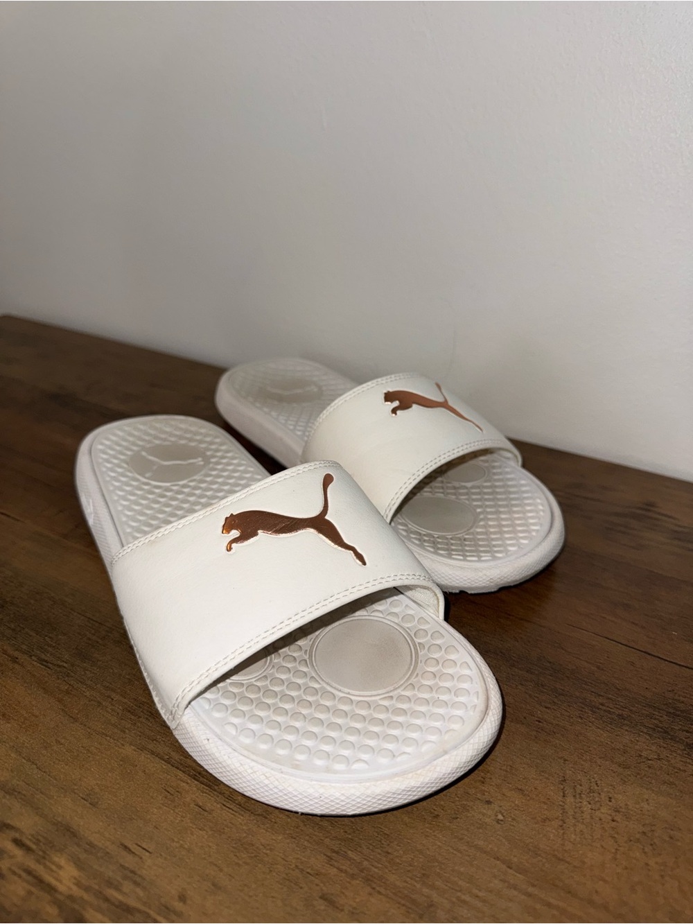 Puma White Slide Sandals with Rose Gold Logo